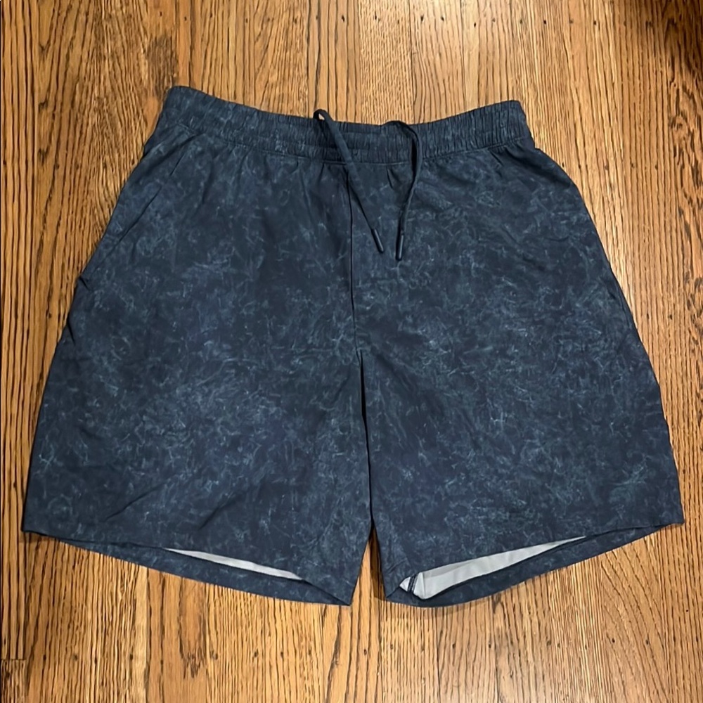 LuLulemon Shorts, draw cord waist, front pickets. Pre-used